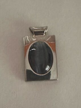 Sterling Silver Pendant with Dark Oval Stone